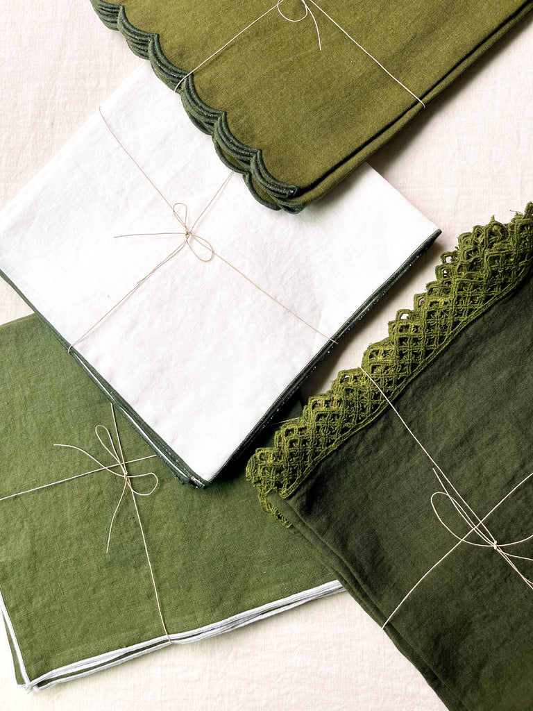 white rolled edge linen napkins with forest green edge 18 inch square with other color options
