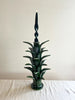 green taper candle holder shaped like the top of a pineapple 16.6 inches tall with candle