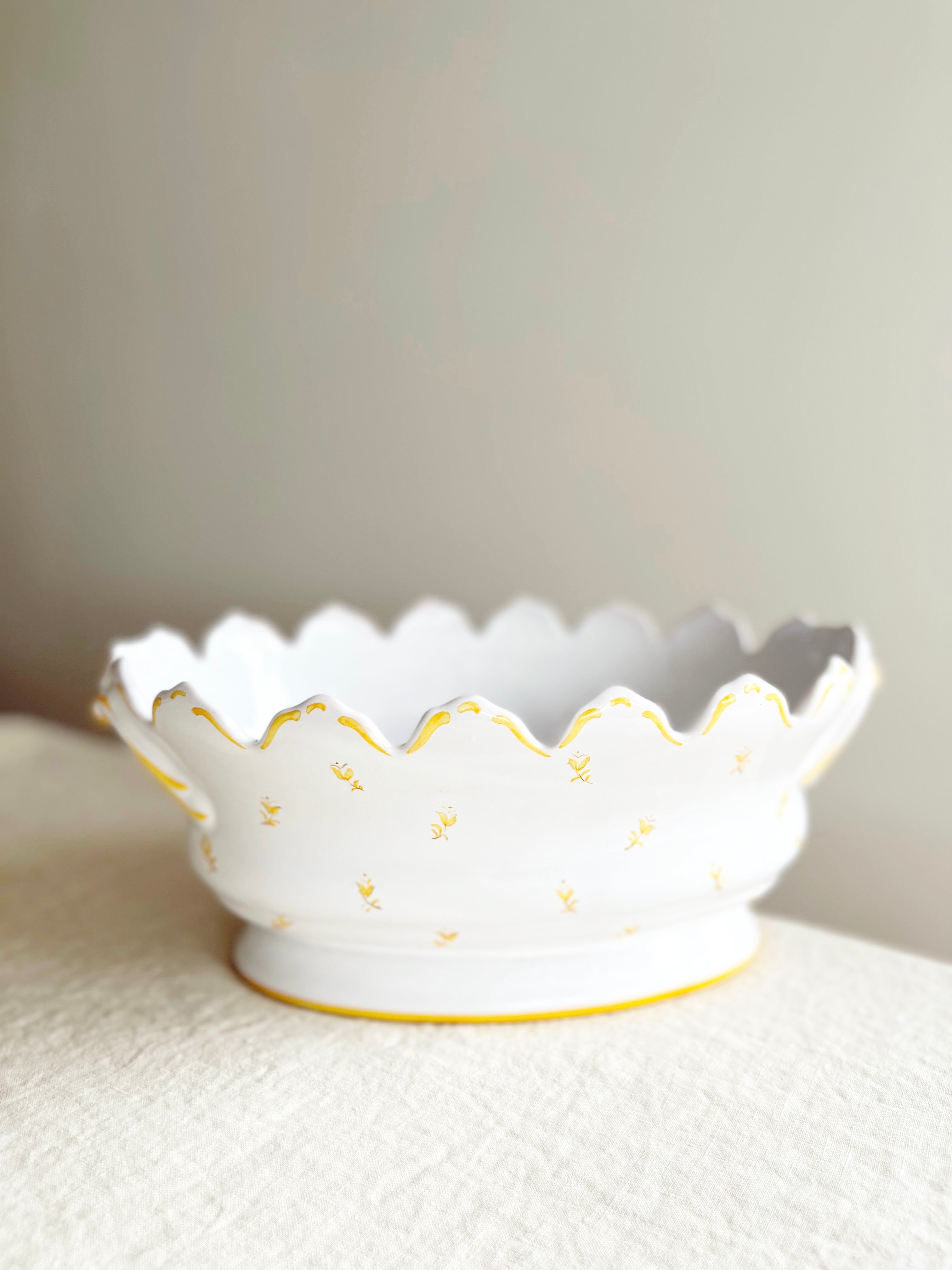 yellow and white jardiniere planter side view