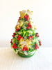 cereria introna decorated christmas tree paraffin candle 9.5 inches tall close up view
