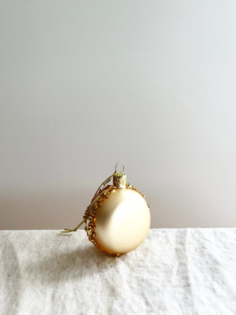 gold macaroon shaped glass christmas ornament