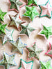 star shaped paper christmas ornaments in shades of green