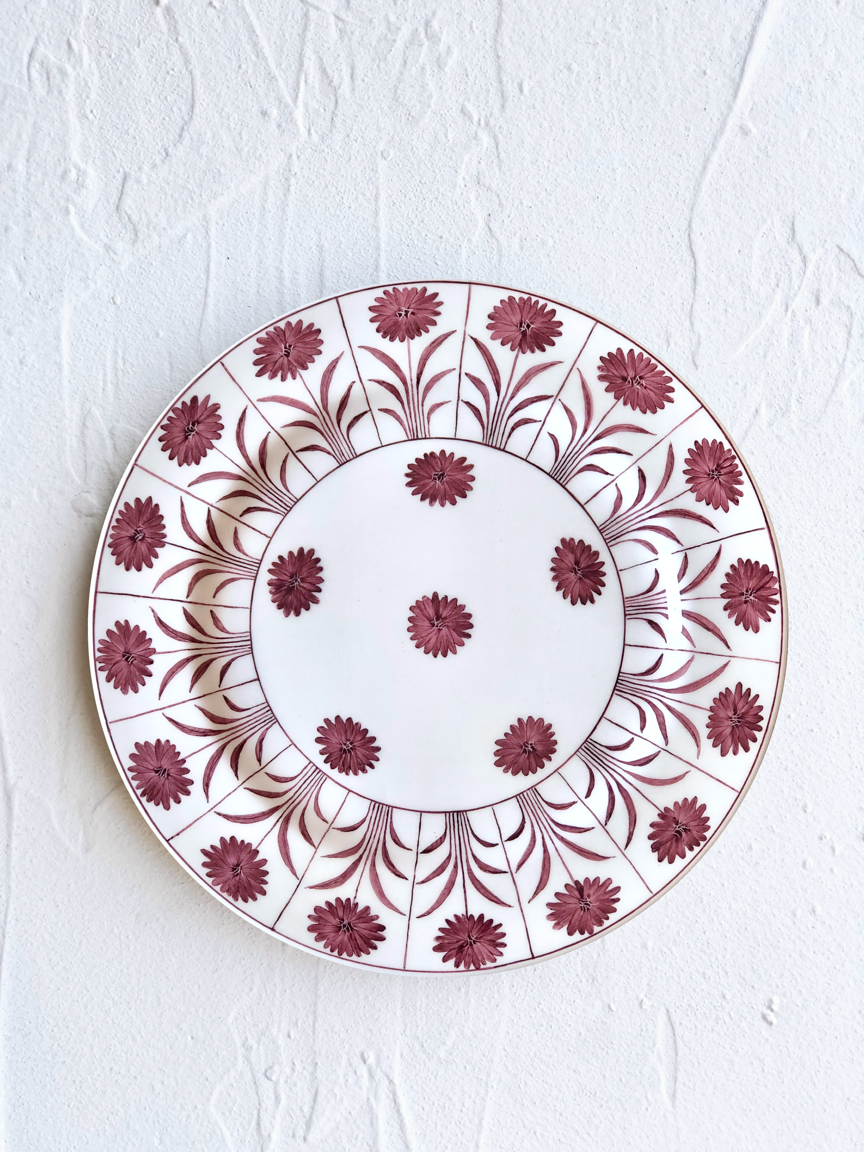 ceramic dinner plate with purple daisy pattern