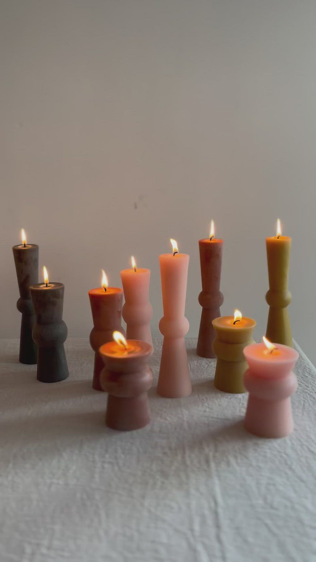 video of assorted totem candles with flame lit