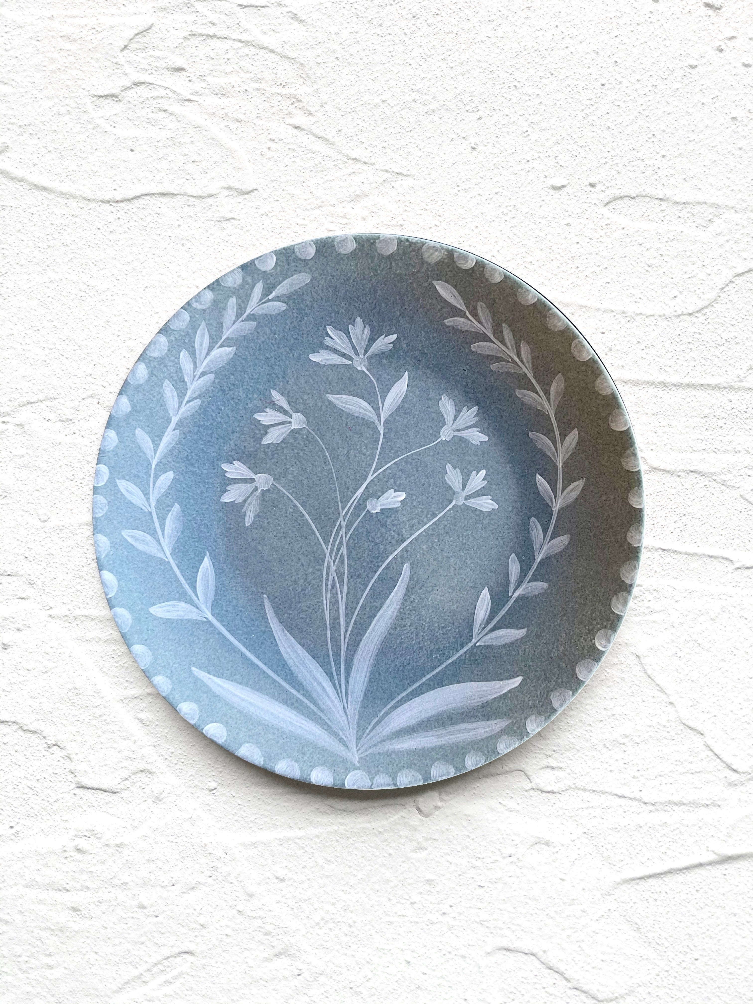 blue salad plate with white floral pattern