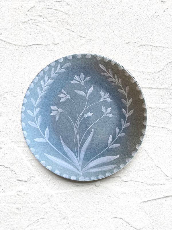 blue salad plate with white floral pattern