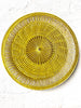 yellow round woven placemat 