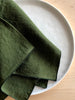 forest green rolled edge linen napkins with teal edge 18 inch square detail view