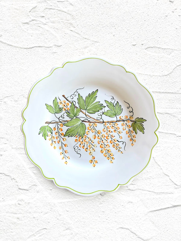 salad plate with green leaves and currants
