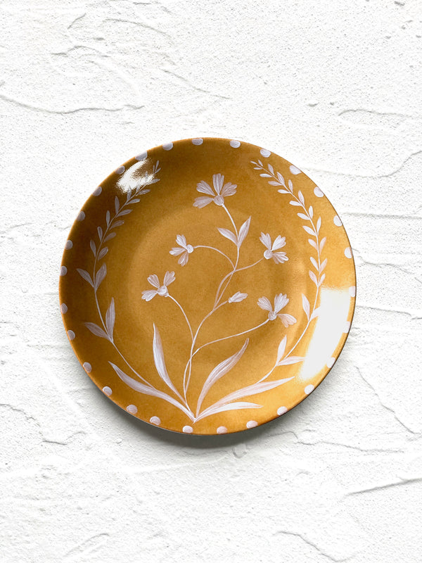 yellow salad plate with white floral pattern