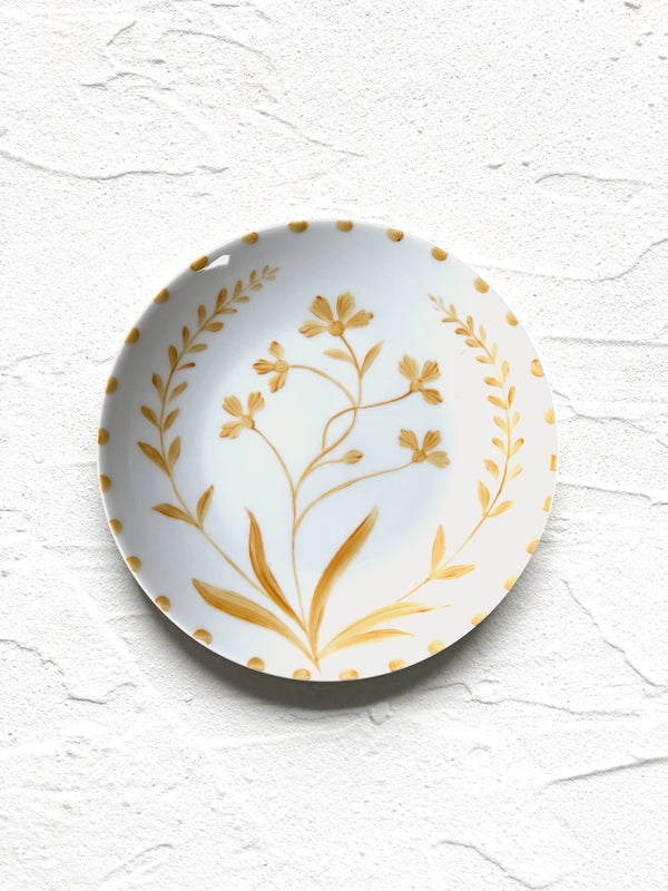 white salad plate with yellow floral pattern