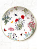 white porcelain charger plate with wildflowers