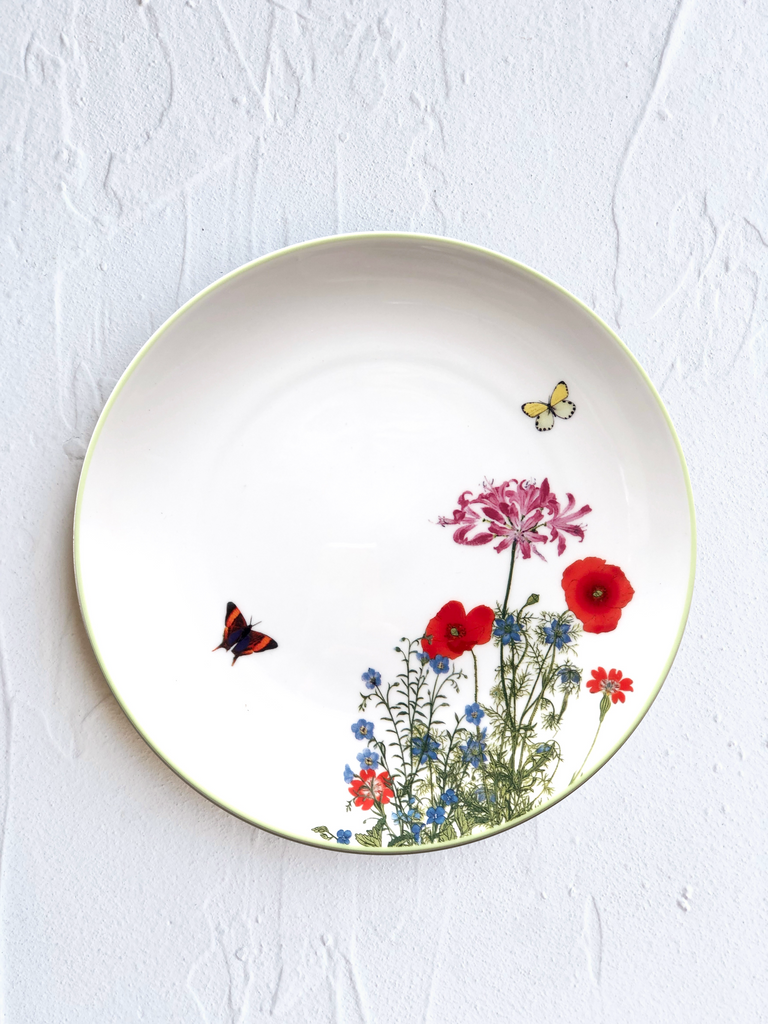 white porcelain dinner plate with wildflowers