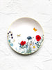 white porcelain salad plate with wildflowers