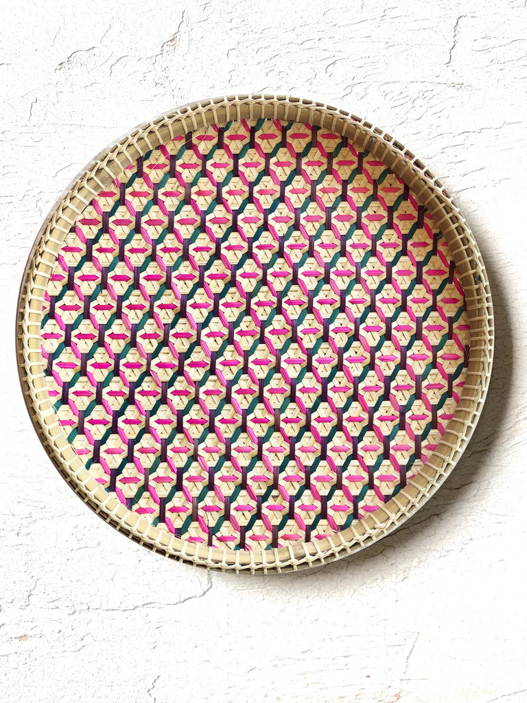 light tan woven tray with pink and green mosaic pattern 12 inches