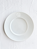 white dinner plate with greek medallion design