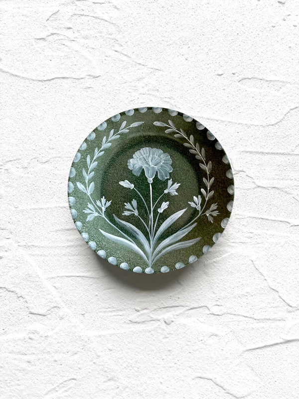dark green limoges porecelain bread plate with hand painted white floral design