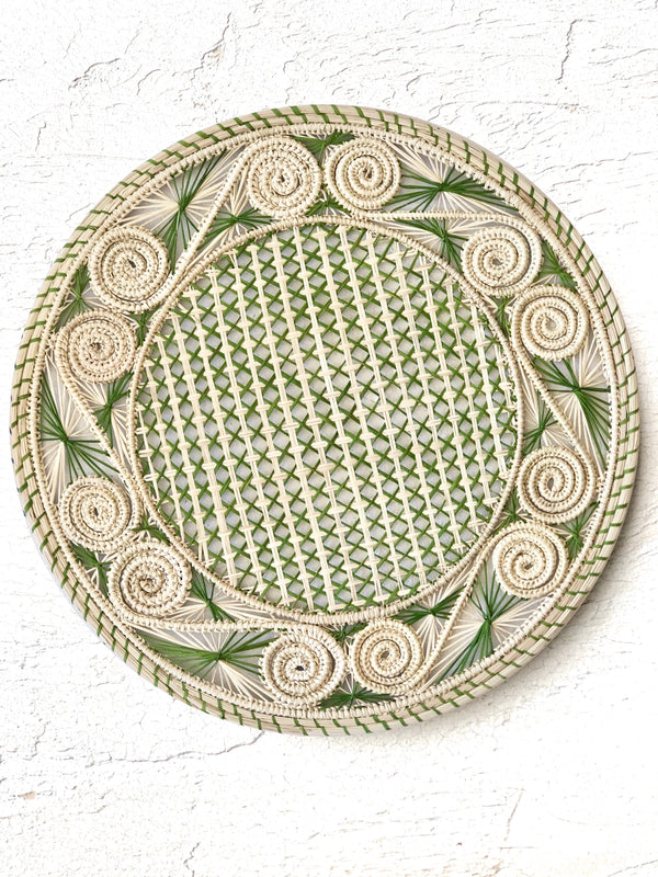 light brown and olive green woven charger made from seagrass 12.5 inches in diameter