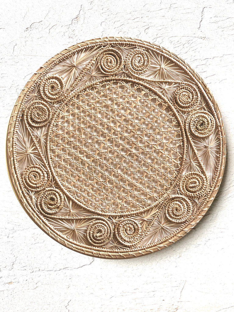 light brown woven charger made from seagrass 12.5 inches in diameter